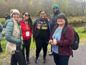 Tralee keynote speakers Jennifer Fawcett (left), Joseph Wilkins (back right) and Conceição Colaço, with conference delegates, during a break in the rain on the field trip near Tralee. Photo by Laura King.